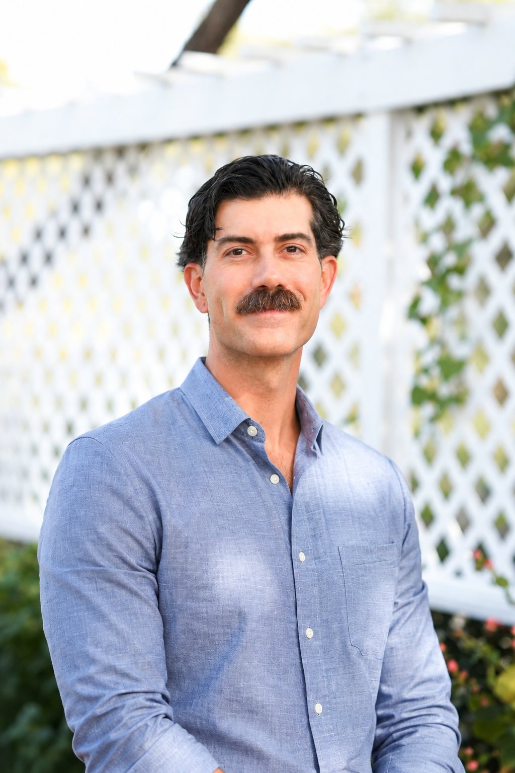Portrait of Andrew Munoz, co-founder of OptyPeptides